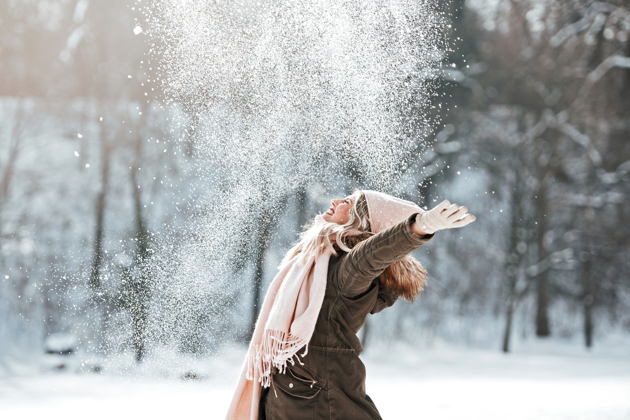 Woman enjoying snow