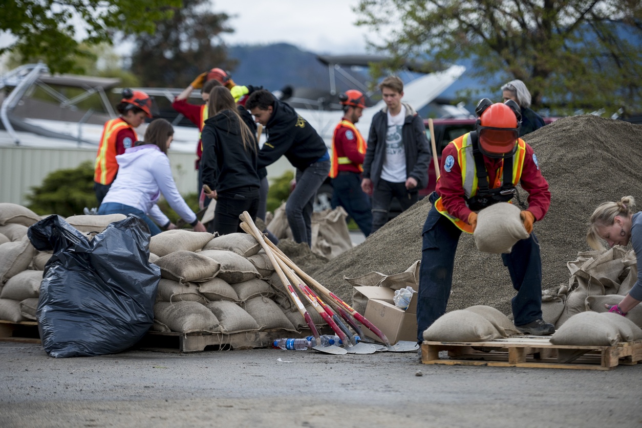 placing sacks to prevent flooding