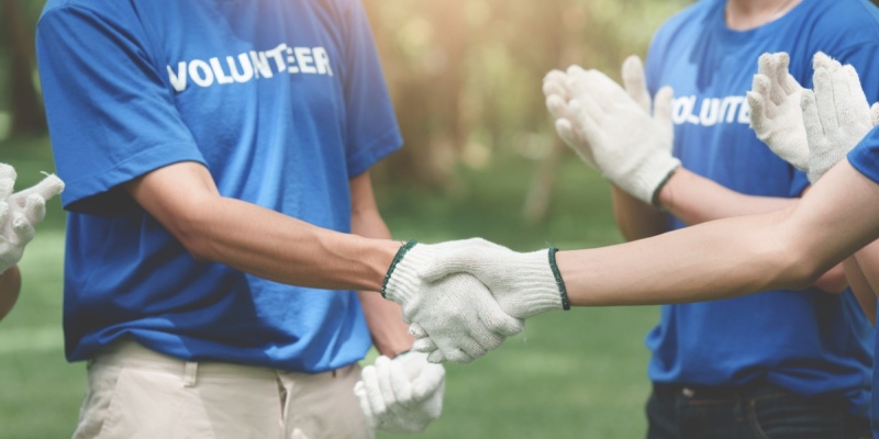 Volunteers shaking hands